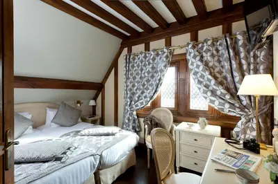 Un ou plusieurs lits dans un hébergement de l'établissement Auberge Saint Pierre