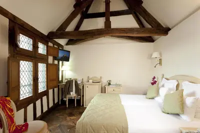 Un ou plusieurs lits dans un hébergement de l'établissement Auberge Saint Pierre