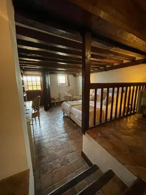Un ou plusieurs lits dans un hébergement de l'établissement Auberge Saint Pierre