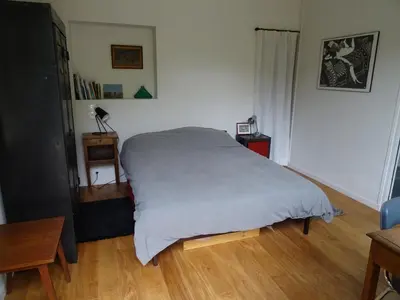 Un ou plusieurs lits dans un hébergement de l'établissement Chambre d'hôtes sur jardin acces PMR