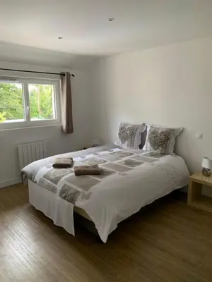 Un ou plusieurs lits dans un hébergement de l'établissement gîte du parc du moulin du pré