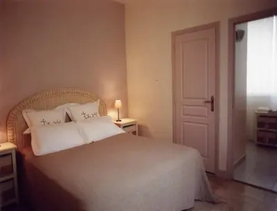 Un ou plusieurs lits dans un hébergement de l'établissement Chambres d'Hotes la Raspeliere