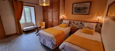 Un ou plusieurs lits dans un hébergement de l'établissement Le Relais de la Comté