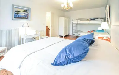 Un ou plusieurs lits dans un hébergement de l'établissement Pet Friendly Home In Aurseulles
