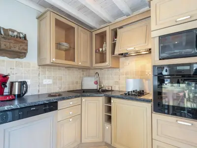 Cuisine ou kitchenette dans l'établissement Holiday Home Zoé by Interhome