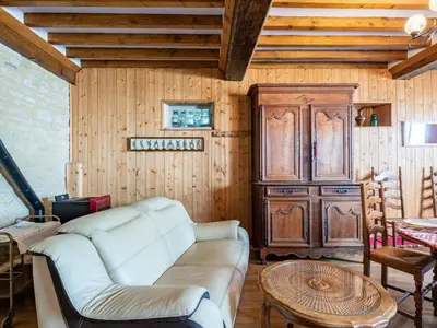 Coin salon dans l'établissement Holiday Home Sténaïs by Interhome