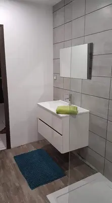 Salle de bains dans l'établissement Le Goeland
