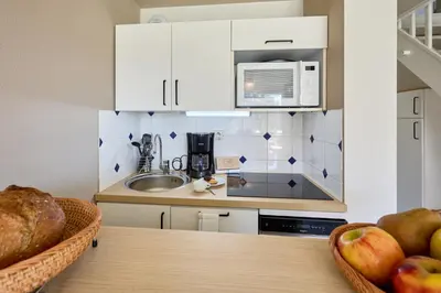 Cuisine ou kitchenette dans l'établissement Residence Pierre & Vacances Port Guillaume