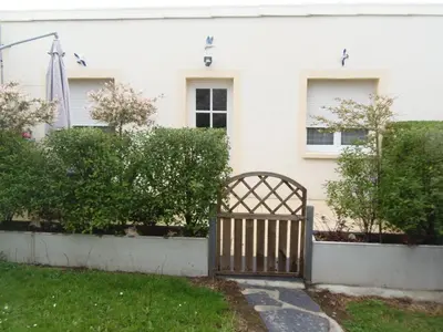 Jardin de l'établissement petite maison de vacance 2 chambres
