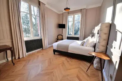 Un ou plusieurs lits dans un hébergement de l'établissement Château de la Bribourdière