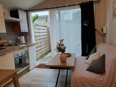 Cuisine ou kitchenette dans l'établissement Joli studio au calme dans un jardin privatif