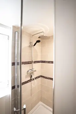 Salle de bains dans l'établissement Charmante petite maison de la côte Normande