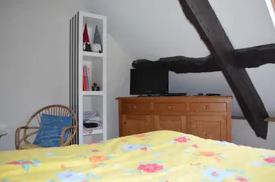 Un ou plusieurs lits dans un hébergement de l'établissement Appartement vue mer Granville
