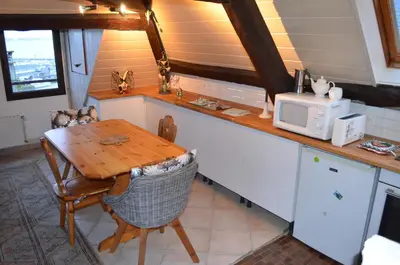 Cuisine ou kitchenette dans l'établissement Appartement vue mer Granville