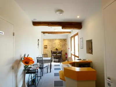 Coin salon dans l'établissement Hôtel Restaurant le clos de l 'Ancien Pressoir