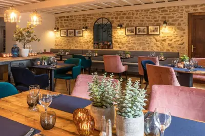 Coin salon dans l'établissement Hôtel restaurant l'Epicurien