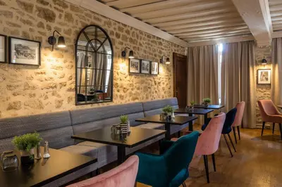 Coin salon dans l'établissement Hôtel restaurant l'Epicurien