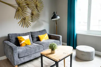 Coin salon dans l'établissement Charmant appartement 4 personnes en centre-ville