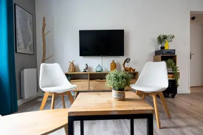 Télévision ou salle de divertissement dans l'établissement Charmant appartement 4 personnes en centre-ville