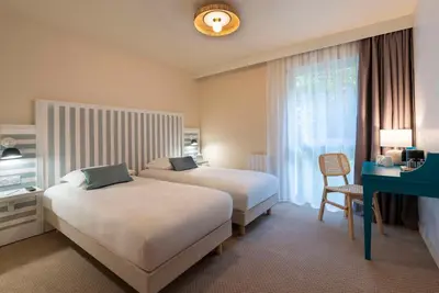 Un ou plusieurs lits dans un hébergement de l'établissement Best Western Flers Centre Gare
