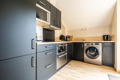 Cuisine ou kitchenette dans l'établissement Les prairies du Mont -La vallée Saint Pierre