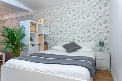 Un ou plusieurs lits dans un hébergement de l'établissement Appartement au calme + parking
