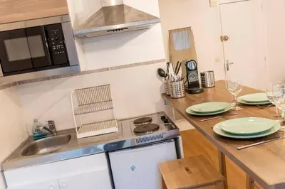 Cuisine ou kitchenette dans l'établissement Appartement au calme + parking