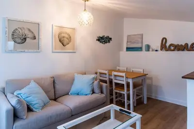 Coin salon dans l'établissement Appartement 2 personnes, Place St Sauveur à 2min