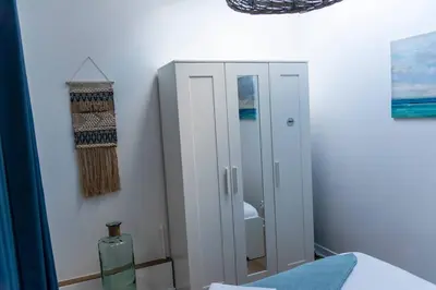 Un ou plusieurs lits dans un hébergement de l'établissement Appartement 2 personnes, Place St Sauveur à 2min