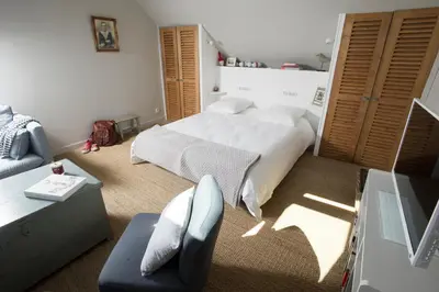 Un ou plusieurs lits dans un hébergement de l'établissement Appartement vue port