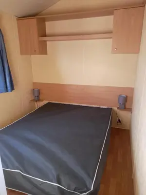 Un ou plusieurs lits dans un hébergement de l'établissement Camping La Baie du Mont Saint Michel