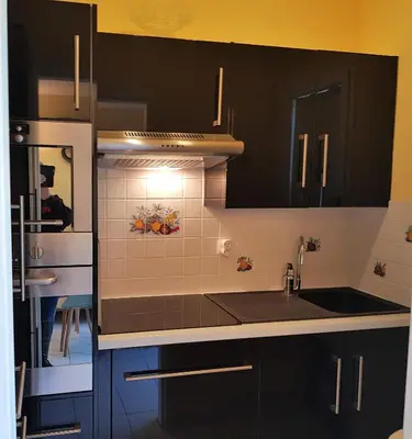 Cuisine ou kitchenette dans l'établissement Appartement Cabourg près de la plage