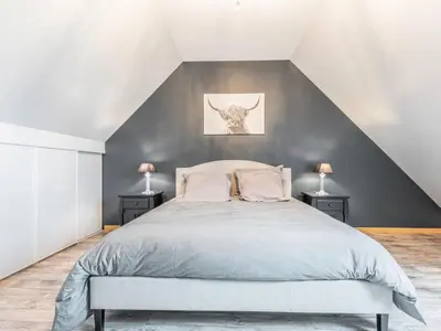 Un ou plusieurs lits dans un hébergement de l'établissement Holiday Home Blue House by Interhome