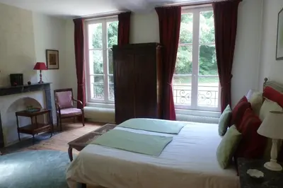Un ou plusieurs lits dans un hébergement de l'établissement Chambres d'hôtes du Bas Manoir