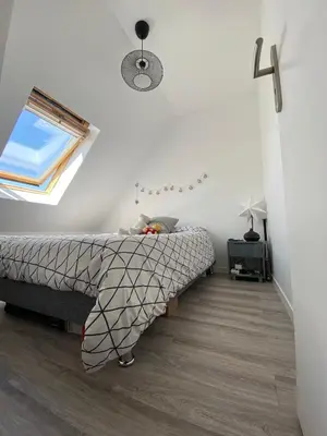 Un ou plusieurs lits dans un hébergement de l'établissement Escapade à Cabourg, 300M plage, calme et chaleureux