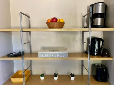 Cuisine ou kitchenette dans l'établissement La Camuche