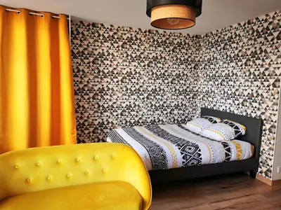 Un ou plusieurs lits dans un hébergement de l'établissement Studio Cosy Breizh