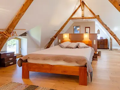 Un ou plusieurs lits dans un hébergement de l'établissement Holiday Home La Gicquelière by Interhome