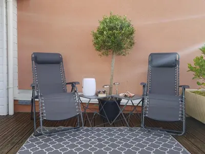 Coin salon dans l'établissement La terrasse, jacuzzi et vue mer Plage à 200m