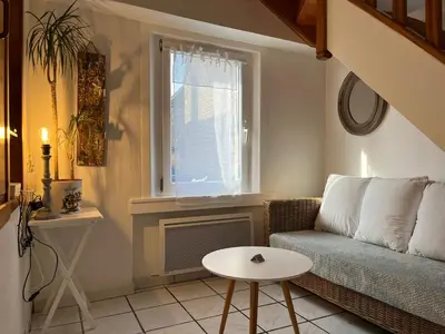 Coin salon dans l'établissement Charmante maison de pêcheur 50 m de la plage et du Port