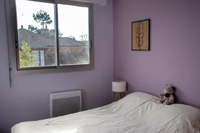 Un ou plusieurs lits dans un hébergement de l'établissement Joli appartement F3 - 50m de la mer