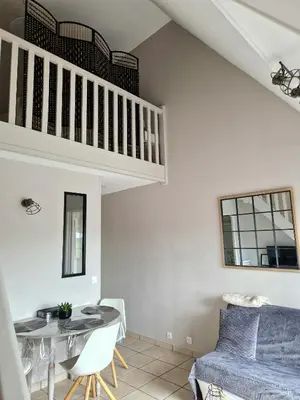 Coin salon dans l'établissement Appartement Balcon Centre Cabourg