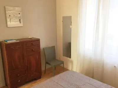 Un ou plusieurs lits dans un hébergement de l'établissement LES ILES VUE SUR MER
