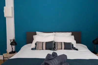 Un ou plusieurs lits dans un hébergement de l'établissement Cabourg Cosy chic Cabourg hyper-centre 4 pers, 2 bedrooms , 2 sdb, terrasse, wifi