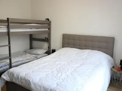 Un ou plusieurs lits dans un hébergement de l'établissement Maison de vacance