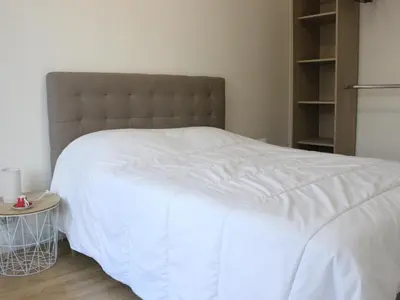 Un ou plusieurs lits dans un hébergement de l'établissement Maison de vacance