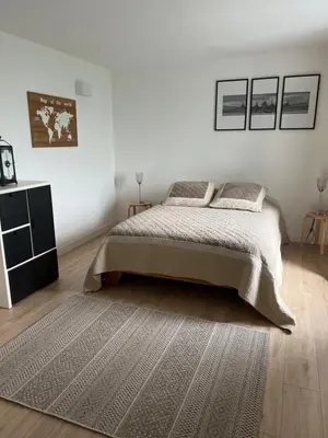 Un ou plusieurs lits dans un hébergement de l'établissement Gîte de charme à la campagne