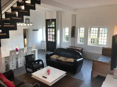 Coin salon dans l'établissement Gîte de charme à la campagne