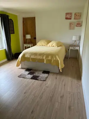 Un ou plusieurs lits dans un hébergement de l'établissement Gîte de charme à la campagne