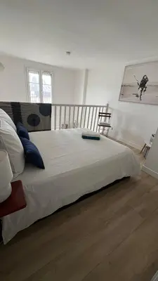 Un ou plusieurs lits dans un hébergement de l'établissement VILLA CATHY DUPLEX PLEIN SUD VUE PORT avec PISCINE INTERIEURE CHAUFFÉE